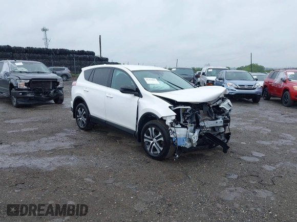 2018 Toyota RAV4 LE with VIN 2T3BFREV7JW851015, listed as a IAAI auction lot 42354042 with 94,603 mi miles and . Bid and sale history available at DreamBid. Image 1.