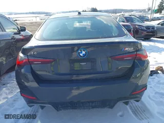 2023 BMW i4 M50 with VIN WBY33AW03PFN81310, listed as a IAAI auction lot 41387873 with 21,586 mi miles. Bid and sale history available at carsss.com. Image 16.