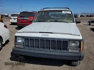 1993 Jeep Cherokee Sport with VIN 1J4FJ68S4PL555701, listed as a Copart auction lot 76020714 with 130,884 mi miles and Salvage Title. Bid and sale history available at carsss.com. Image 5.