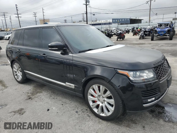 2014 Land Rover Range Rover Supercharged with VIN SALGS3TF0EA165129, listed as a Copart auction lot 50652275 with 121,131 mi miles and Salvage title. Bid and sale history available at DreamBid. Image 4.