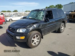 1999 Toyota RAV4 with VIN JT3GP10V1X7063030, listed as a Copart auction lot 52718895 with 241,837 mi miles and Salvage Title. Bid and sale history available at DreamBid. Image 1.