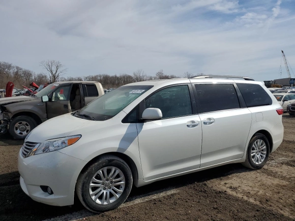 2015 Toyota Sienna XLE with VIN 5TDYK3DC0FS662380, listed as a Copart auction lot 48795755 with 108,949 mi miles and Salvage Title. Bid and sale history available at carsss.com. Image 1.