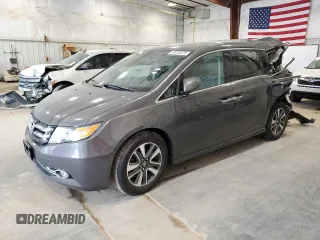 2015 Honda Odyssey Touring Elite with VIN 5FNRL5H90FB091554, listed as a Copart auction lot 58139275 with 164,357 mi miles and Non repairable. Bid and sale history available at DreamBid. Image 1.