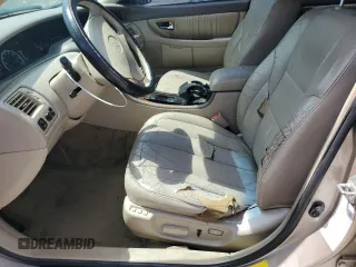 2001 Toyota Avalon XL z VIN 4T1BF28B41U191680, wystawiony jako Copart lot #53956735 z przebiegiem 177 149 mil mil oraz Szkody całkowita. Historia ofert i sprzedaży dostępna na DreamBid. Obrazek 7.