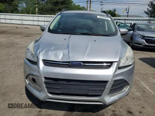 2014 Ford Escape SE with VIN 1FMCU9GX3EUB19987, listed as a Copart auction lot 64042695 with 96,775 mi miles and Salvage title. Bid and sale history available at DreamBid. Image 5.