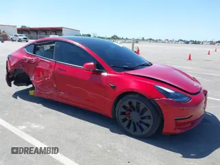 2023 Tesla Model 3 Performance with VIN 5YJ3E1EC4PF382746, listed as a IAAI auction lot 41992117 with 41,906 mi miles. Bid and sale history available at carsss.com. Image 1.