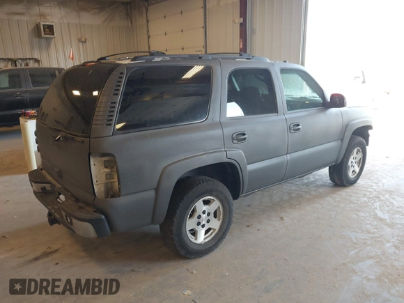 2004 Chevrolet Tahoe LS with VIN 1GNEK13ZX4J204098, listed as a IAAI auction lot 42143393 with 293,548 mi miles. Bid and sale history available at carsss.com. Image 4.