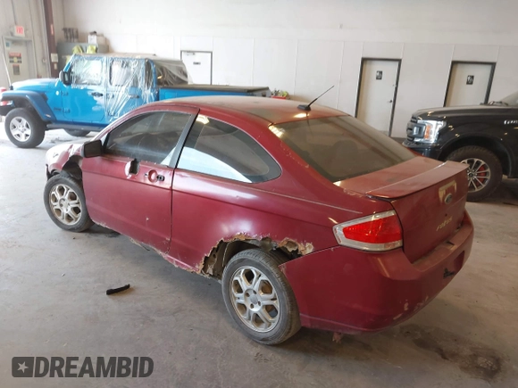 2009 Ford Focus SE with VIN 1FAHP32N49W222419, listed as a IAAI auction lot 42113655 with 238,936 mi miles. Bid and sale history available at carsss.com. Image 3.