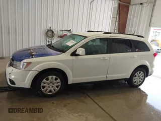2019 Dodge Journey SE with VIN 3C4PDCBBXKT835029, listed as a IAAI auction lot 42120482 with 130,282 mi miles and . Bid and sale history available at DreamBid. Image 14.