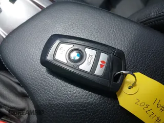 2014 BMW 3 Series 320i xDrive with VIN WBA3C3C51EP662162, listed as a IAAI auction lot 42019994 with 78,066 mi miles. Bid and sale history available at carsss.com. Image 11.