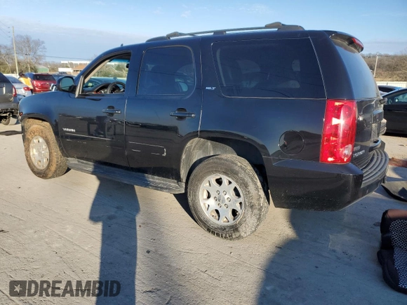 2012 GMC Yukon SLT with VIN 1GKS1CE03CR319767, listed as a Copart auction lot 87152274 with 164,591 mi miles and Salvage Title. Bid and sale history available at carsss.com. Image 2.
