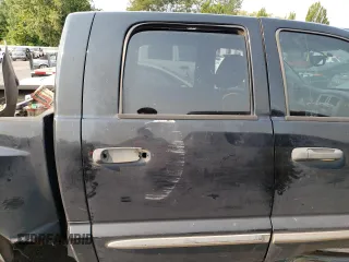 2005 Dodge Dakota Laramie with VIN 1D7HW58N65S161629, listed as a Copart auction lot 66570164 with 205,984 mi miles and Salvage Title. Bid and sale history available at carsss.com. Image 10.