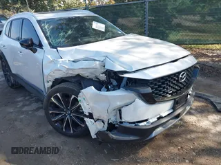 2024 Mazda CX-50 Premium z VIN 7MMVABDY3RN207237, wystawiony jako IAAI lot #41044580 z przebiegiem 3381 mil mil oraz . Historia ofert i sprzedaży dostępna na DreamBid. Obrazek 6.