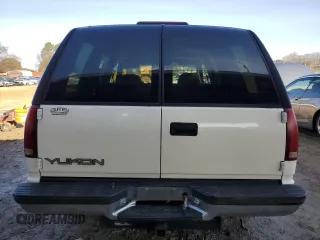 1999 GMC Yukon with VIN 1GKEC13R0XJ811710, listed as a Copart auction lot 43014995 with 311,948 mi miles and Salvage Title. Bid and sale history available at carsss.com. Image 6.