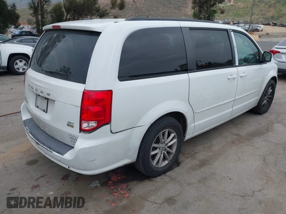 2014 Dodge Grand Caravan SXT with VIN 2C4RDGCG1ER304836, listed as a IAAI auction lot 42049558 with 186,831 mi miles and . Bid and sale history available at DreamBid. Image 4.