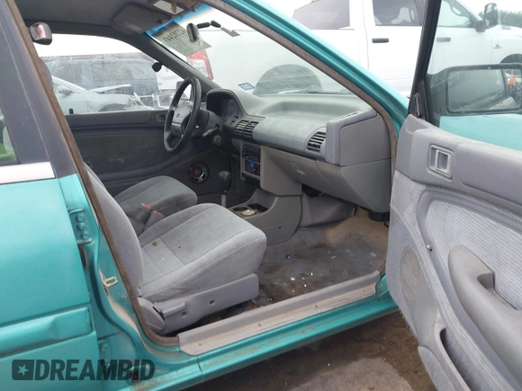 1994 Ford Escort z VIN 3FARP13J0RR121191, wystawiony jako IAAI lot #42202443 z przebiegiem 111 111 mil mil oraz . Historia ofert i sprzedaży dostępna na DreamBid. Obrazek 5.