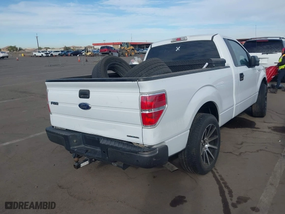 2014 Ford F-150 XL with VIN 1FTMF1CM3EKG36797, listed as a IAAI auction lot 40892574 with 136,417 mi miles. Bid and sale history available at carsss.com. Image 4.
