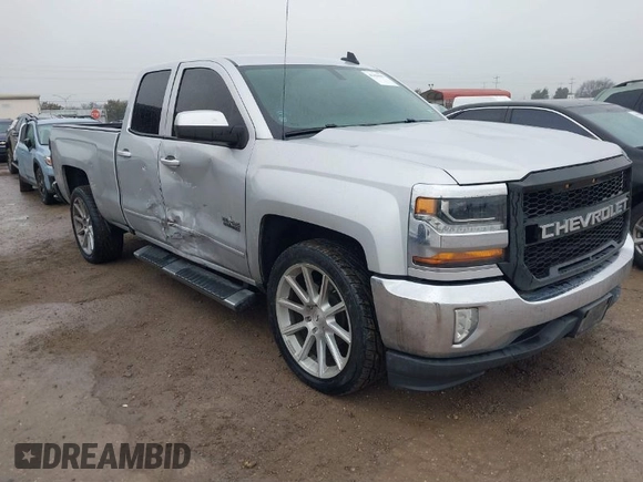 2018 Chevrolet Silverado 1500 LT with VIN 1GCRCREC4JZ287085, listed as a IAAI auction lot 41450057 with 79,275 mi miles and . Bid and sale history available at DreamBid. Image 1.