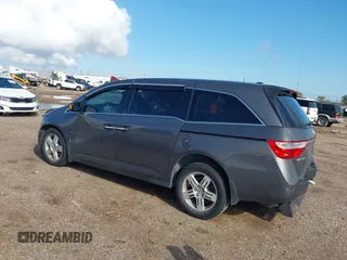 2011 Honda Odyssey Touring with VIN 5FNRL5H93BB104436, listed as a IAAI auction lot 40426003 with 93,342 mi miles and . Bid and sale history available at DreamBid. Image 3.