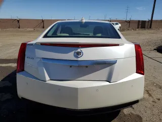 2014 Cadillac ELR z VIN 1G6RR1E48EU600850, wystawiony jako Copart lot #55169115 z przebiegiem 26 604 mil mil oraz Szkody całkowita. Historia ofert i sprzedaży dostępna na DreamBid. Obrazek 6.