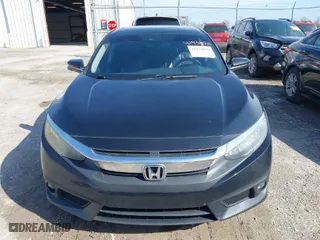 2016 Honda Civic Sedan Touring with VIN 19XFC1F9XGE043422, listed as a IAAI auction lot 41930030 with 141,027 mi miles. Bid and sale history available at carsss.com. Image 12.