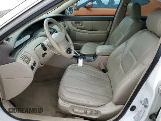 2001 Toyota Avalon XL z VIN 4T1BF28B01U154951, wystawiony jako Copart lot #54941495 z przebiegiem 256 554 mil mil oraz Nie do naprawy • Non repairable. Historia ofert i sprzedaży dostępna na DreamBid. Obrazek 7.