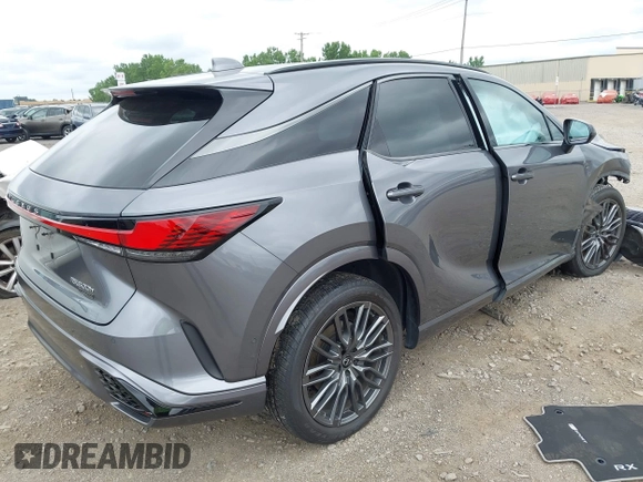 2023 Lexus RX 500h F Sport Performance with VIN 2T2BCMEA8PC001532, listed as a IAAI auction lot 42674608 with 22,051 mi miles and . Bid and sale history available at DreamBid. Image 4.