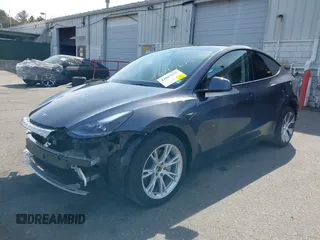 2023 Tesla Model Y Long Range with VIN 7SAYGDEE7PF856985, listed as a IAAI auction lot 42097675 with 13,112 mi miles and . Bid and sale history available at DreamBid. Image 22.