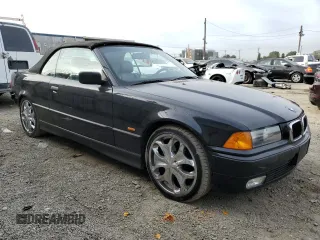 1999 BMW 3 Series 323icA with VIN WBABJ833XXEM22958, listed as a Copart auction lot 84696234 with 112,514 mi miles and Salvage Title. Bid and sale history available at carsss.com. Image 4.