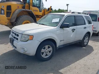 2010 Ford Escape Hybrid with VIN 1FMCU4K35AKC14385, listed as a IAAI auction lot 42182581 with 115,974 mi miles and . Bid and sale history available at DreamBid. Image 2.