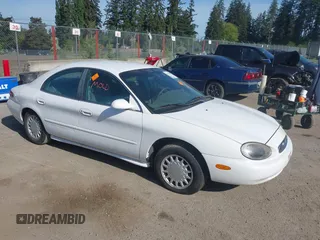 1997 Mercury Sable GS z VIN 1MELM50U4VG644616, wystawiony jako IAAI lot #42229344 z przebiegiem 121 780 mil mil oraz . Historia ofert i sprzedaży dostępna na DreamBid. Obrazek 1.