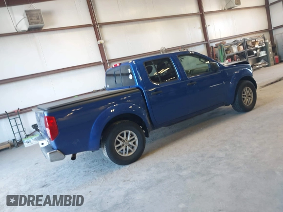 2014 Nissan Frontier SV with VIN 1N6AD0ER0EN766382, listed as a IAAI auction lot 41687781 with 143,804 mi miles and . Bid and sale history available at DreamBid. Image 4.