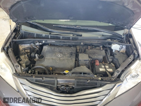 2011 Toyota Sienna LE AAS with VIN 5TDKK3DC8BS117009, listed as a Copart auction lot 56035065 with 148,160 mi miles and Salvage Title. Bid and sale history available at DreamBid. Image 12.