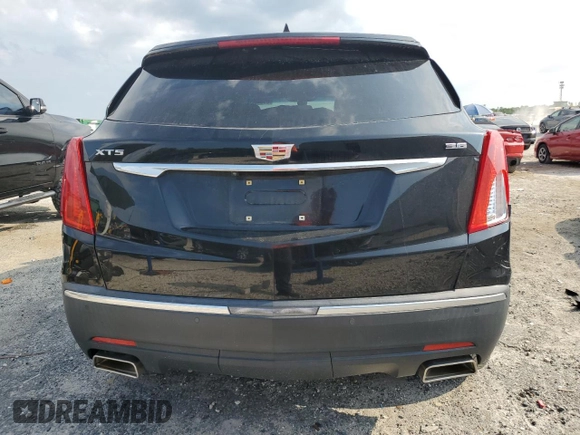 2017 Cadillac XT5 FWD with VIN 1GYKNARS0HZ283618, listed as a Copart auction lot 61640005 with 113,823 mi miles and Salvage title. Bid and sale history available at DreamBid. Image 6.
