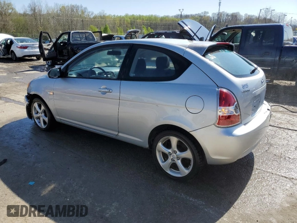 2007 Hyundai Accent SE z VIN KMHCN36C47U027122, wystawiony jako Copart lot #52224605 z przebiegiem 169 022 mil mil oraz Szkoda całkowita • Salvage title. Historia ofert i sprzedaży dostępna na DreamBid. Obrazek 2.