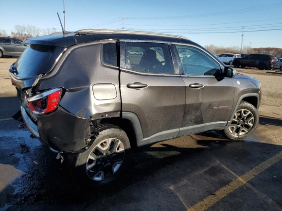 2018 Jeep Compass Trailhawk with VIN 3C4NJDDB4JT192663, listed as a Copart auction lot 79202704 with 73,665 mi miles and Salvage title. Bid and sale history available at DreamBid. Image 3.