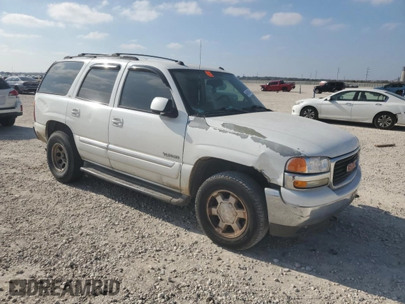 2005 GMC Yukon SLT z VIN 1GKEC13T05J143724, wystawiony jako Copart lot #44611845 z przebiegiem 197 183 mil mil oraz Szkoda całkowita • Salvage title. Historia ofert i sprzedaży dostępna na DreamBid. Obrazek 4.