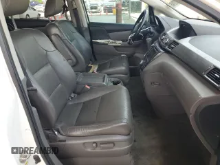 2014 Honda Odyssey Touring z VIN 5FNRL5H9XEB123330, wystawiony jako Copart lot #59023145 z przebiegiem 118 371 mil mil oraz Nie do naprawy • Non repairable. Historia ofert i sprzedaży dostępna na DreamBid. Obrazek 7.