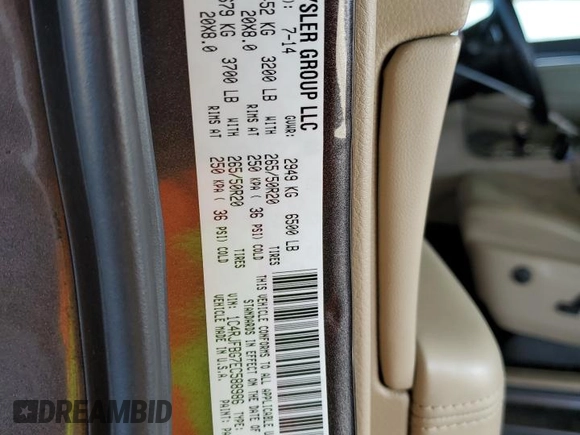 2014 Jeep Grand Cherokee Limited with VIN 1C4RJFBG7EC588986, listed as a Copart auction lot 52284405 with 92,702 mi miles and Salvage Title. Bid and sale history available at DreamBid. Image 12.