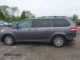 2014 Toyota Sienna XLE with VIN 5TDYK3DC0ES436502, listed as a IAAI auction lot 42180990 with 154,839 mi miles and . Bid and sale history available at DreamBid. Image 15.