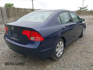 2006 Honda Civic LX with VIN 1HGFA16546L005906, listed as a IAAI auction lot 42182142 with 167,663 mi miles and . Bid and sale history available at DreamBid. Image 4.