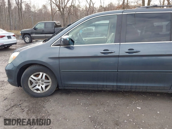 2005 Honda Odyssey EX-L with VIN 5FNRL38645B008281, listed as a IAAI auction lot 41985052 with 219,693 mi miles. Bid and sale history available at carsss.com. Image 6.
