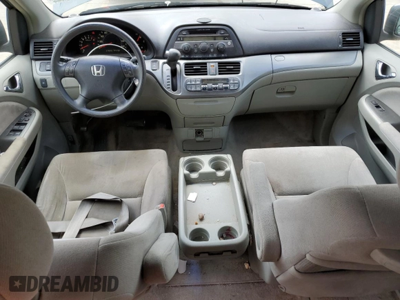 2006 Honda Odyssey EX with VIN 5FNRL38416B446272, listed as a Copart auction lot 57165545 with 219,042 mi miles and Salvage title. Bid and sale history available at DreamBid. Image 8.