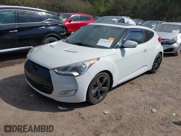 2014 Hyundai Veloster with VIN KMHTC6AD1EU217707, listed as a IAAI auction lot 41718176 with 191,306 mi miles. Bid and sale history available at carsss.com. Image 2.