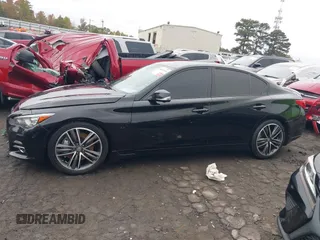 2015 Infiniti Q50 Premium with VIN JN1BV7AR1FM411864, listed as a IAAI auction lot 40800193 with 104,154 mi miles. Bid and sale history available at carsss.com. Image 13.
