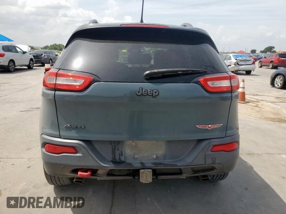 2014 Jeep Cherokee Trailhawk with VIN 1C4PJMBS0EW185737, listed as a Copart auction lot 63463015 with 199,983 mi miles and Clean title. Bid and sale history available at DreamBid. Image 6.