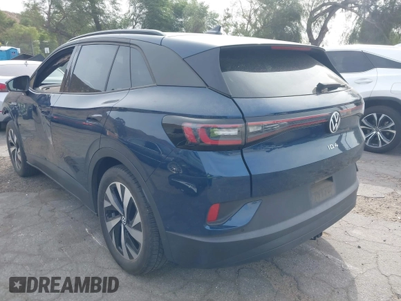 2023 Volkswagen ID.4 Pro z VIN 1V2DNPE8XPC019169, wystawiony jako IAAI lot #41313501 z przebiegiem 32 552 mil mil oraz . Historia ofert i sprzedaży dostępna na DreamBid. Obrazek 3.