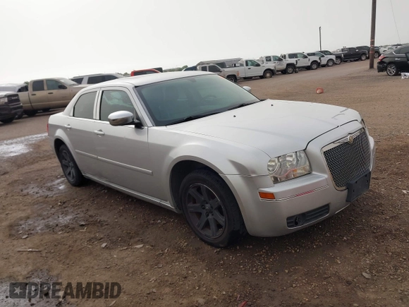 2006 Chrysler 300 Touring with VIN 2C3KA53G36H384442, listed as a IAAI auction lot 41817539 with 129,123 mi miles. Bid and sale history available at carsss.com. Image 13.