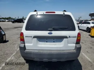 2007 Ford Escape Hybrid with VIN 1FMCU49H87KB61613, listed as a Copart auction lot 58083235 with 129,049 mi miles and Salvage title. Bid and sale history available at DreamBid. Image 6.