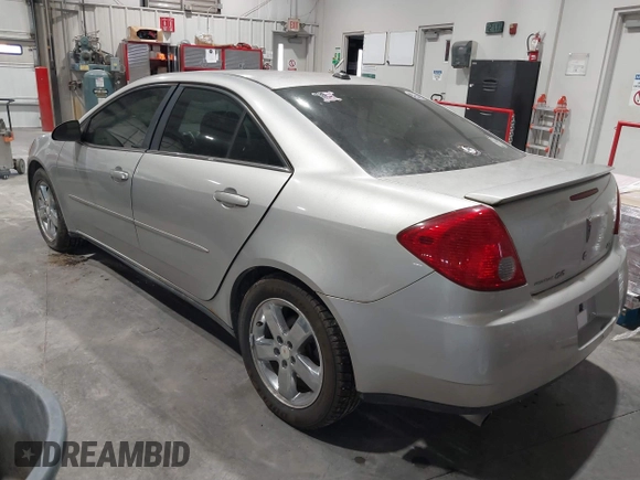 2005 Pontiac G6 GT with VIN 1G2ZH528854167162, listed as a IAAI auction lot 40973635 with 207,742 mi miles. Bid and sale history available at carsss.com. Image 3.